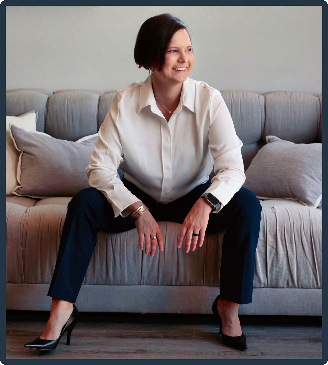 Richelle Calicott sitting on a couch